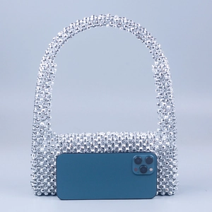 Silver beaded flap handbag with acrylic multifaceted beads and large round handle