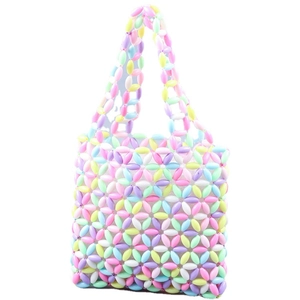 Sac à main en perles macaron tissé main avec motif floral ajouré et deux poignées