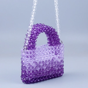 Detailed side view of handmade purple gradient beaded handbag with acrylic chain strap