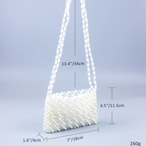Detailed size specifications of the handmade cream and clear acrylic beaded shoulder bag