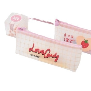Pink mesh pencil case with strawberry print and zipper closure on white background