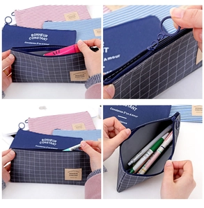 Detailed views of striped and checkered oxford cloth pencil cases with ring zipper pulls