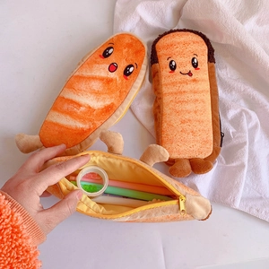 Creative toast and croissant shaped plush pencil cases with cute cartoon facial expressions