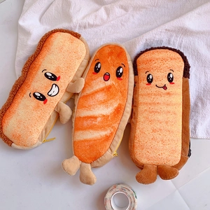 Detailed view of plush creative toast and baguette pencil cases with cute expressions