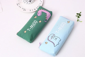 Close-up of canvas pencil pouches with cute dinosaur print and sturdy zippers