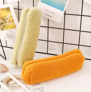 Cute lamb wool pencil case in lime green and orange with soft sherpa texture and zipper