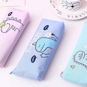 Three cute dinosaur canvas pencil cases in pastel pink, purple, and sky blue colors