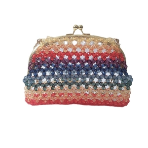 Handmade rainbow acrylic beaded clutch bag with colorful stripes and gold metal frame