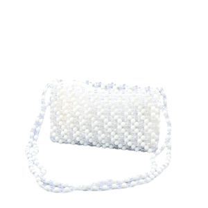 Handmade beaded shoulder bag featuring white and clear acrylic pearls in a wave pattern