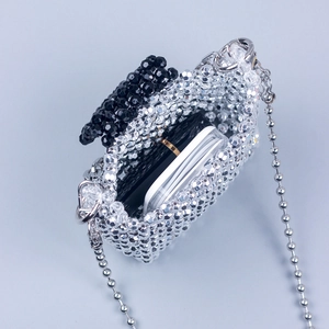 Sparkling silver beaded mini crossbody bag with black contrast flap and metal ball chain