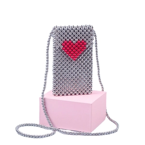 Handmade beaded mini crossbody phone bag in silver with a red heart pattern