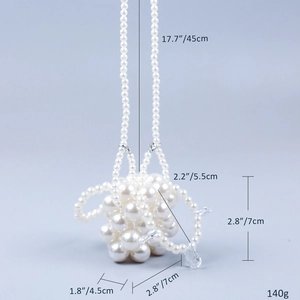 Detail van de handgemaakte mini-pareltas met afmetingen en gewichtsspecificatie 140g