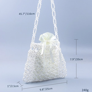 Elegant white handmade pearl woven crossbody bag with hollow square pattern and drawstring bag