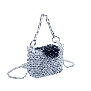 Sparkling silver handmade beaded handbag with black bead bow and silver chain strap