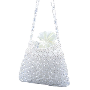 Elegant ivory pearl beaded crossbody bag with hollow grid pattern and satin drawstring pouch