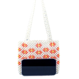 Handmade white beaded handbag with orange floral patterns and double top handles