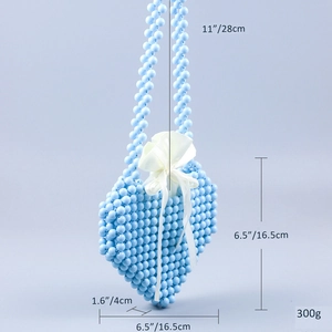 Detailed dimensions of heart-shaped beaded crossbody bag with dimensions and strap length
