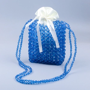 Elegant blue hand-woven beaded shoulder bag with white satin drawstring inner pouch