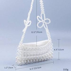 Detailed view showing dimensions of a white pearl beaded shoulder bag with floral strap