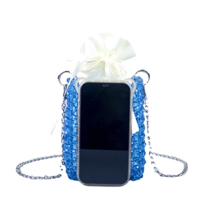 Blue handmade beaded crossbody bag with silver chain and white drawstring liner