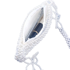 Handmade white pearl beaded underarm bag with flower weave, zipper closure, and inner lining