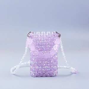 Handmade lavender beaded mini crossbody bag with heart accents and iridescent beads