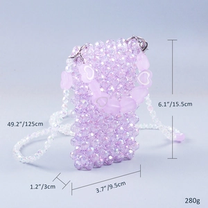 Detail view of lavender beaded mini crossbody bag with heart handle and dimensions