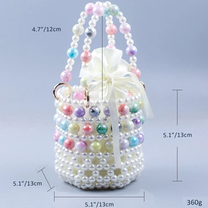 Detail of beaded bucket bag showing pearl texture and drawstring satin liner with dimensions