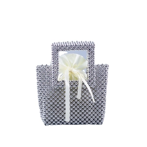 Handmade silver beaded tote bag with a luxury satin drawstring lining for evening parties