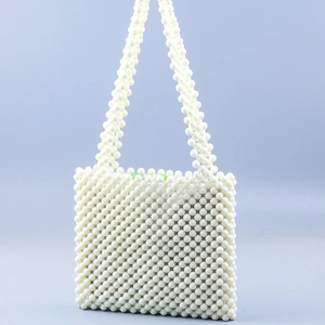 Handmade white beaded strawberry pearl tote bag with minimalist square woven design