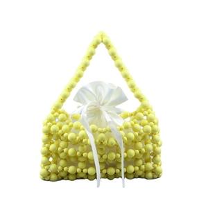 Handmade yellow beaded shoulder bag with white satin drawstring liner for women