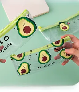 Detailed view of a transparent PVC pencil case with a cute avocado print and green zipper