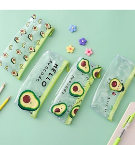 Detail of transparent PVC avocado pencil cases with zipper closure and cute green patterns
