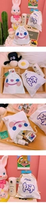 Cute cartoon smile drawstring storage bag and cream bear thermos in aesthetic setup