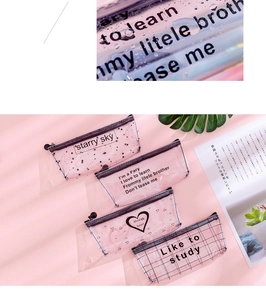 Detail von vier rosa halbtransparenten Mäppchen mit Sternen, Zitaten und Karomustern