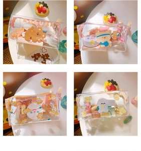 Detailed grid view of cute transparent PVC makeup bags with various cartoon animal prints