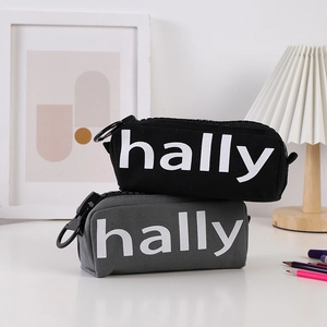 Close-up of hally canvas pencil cases with large zippers in black and grey styles