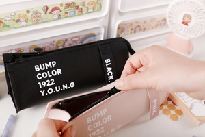Detail showing high capacity PU leather pencil cases with smooth zipper in pink and black
