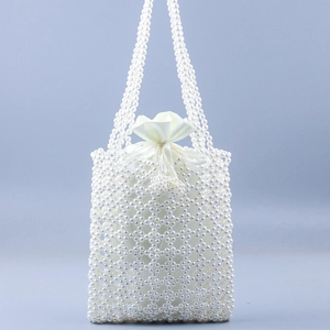Sac à main en perles tissées main avec motif losange ajouré et pochette intérieure en satin