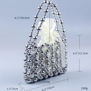 Detail view of silver beaded handbag with white satin drawstring bag and dimensions