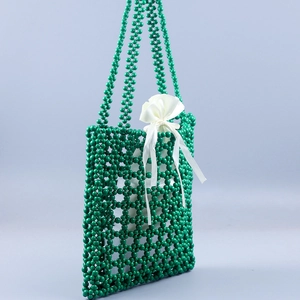 Retro emerald green beaded tote bag with white satin bow and grid woven structure