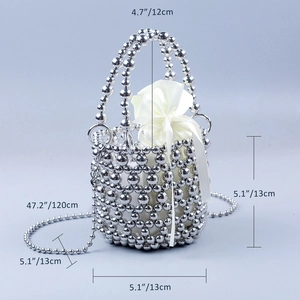 Detailed view of silver metal beaded bucket bag with drawstring satin pouch and sizing