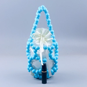 Handmade sky blue beaded bucket bag with white satin drawstring liner for women
