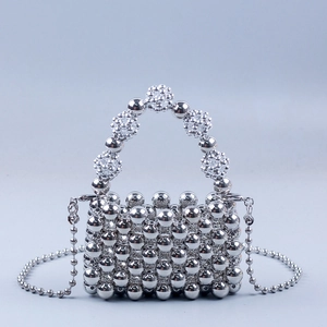 Silver beaded mini bag with handle and crossbody chain for lipstick and essentials