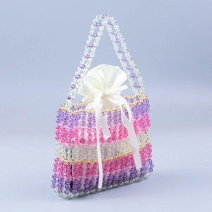 Handmade beaded rainbow handbag with purple and pink acrylic beads and satin pouch