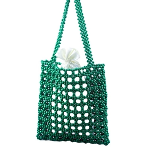 Handmade green beaded tote bag with hollow diamond mesh and white satin drawstring pouch