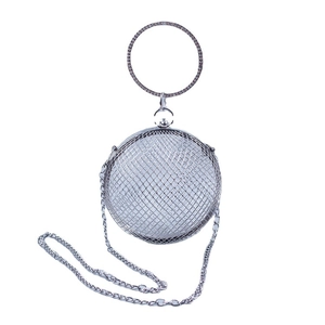 Spherical hollow metal mesh evening bag with rhinestone ring handle and silver chain strap