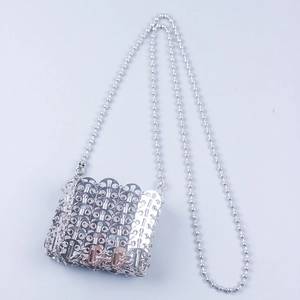 Silver metal sequin crossbody bag with chain strap and shimmering chainmail texture