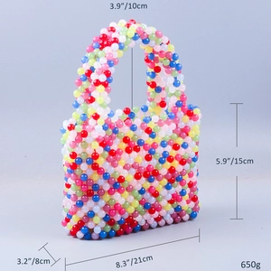 Detailed dimensions of a colorful handmade beaded handbag with 650g weight spec