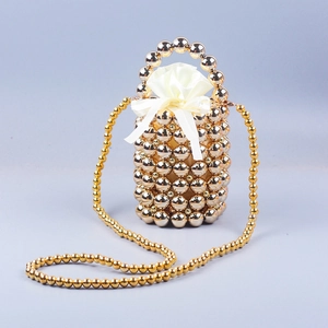 Handmade gold beaded bucket bag with satin drawstring liner and shoulder chain